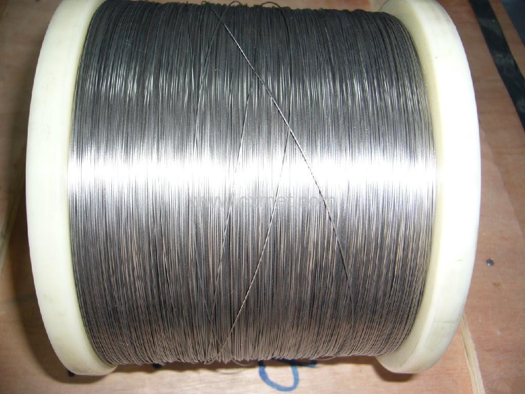 Carburizing surface treatment of titanium wire